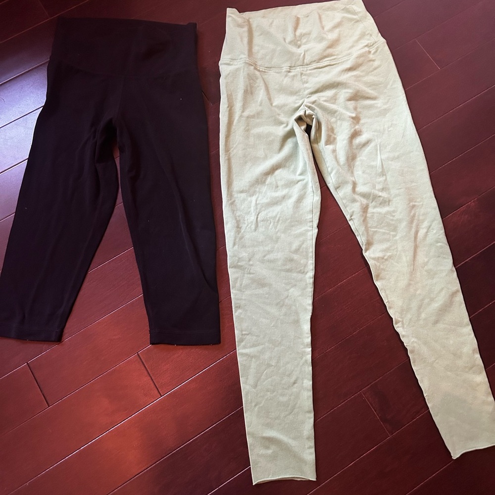 TNA pants one black and one green